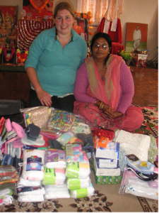 Jessica and Amaa with the gifts for the children