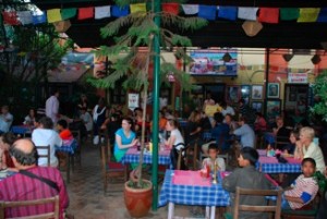 The audience gathering in the cafe before the fun starts