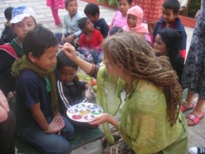 Volunteers take part in the Bhai-Tikka ritual