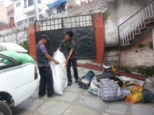 The older boys packing up the clothes