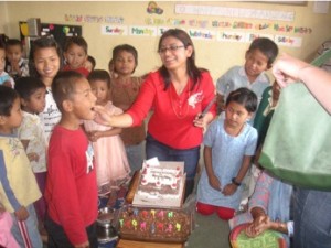 Pramila sharing her birthday with all the children
